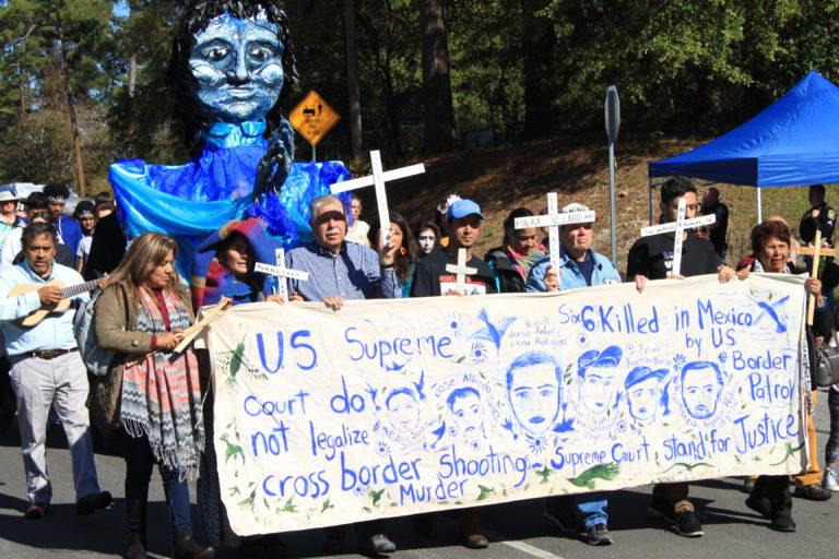 Protest march outside School of the Americas at Fort Benning, Georgia, where Immigration and Customs Enforcement (ICE) agents are trained. Photo by Sunny Robinson, November 2019.