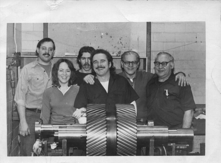 Jeff Klein (left) with co-workers at GE Lynn, circa 1979. The Steam Turbine division of GE Lynn was closed in the late 1980s and “Building 57” where the photo is from was torn down , along with other buildings, and made into a parking lot.