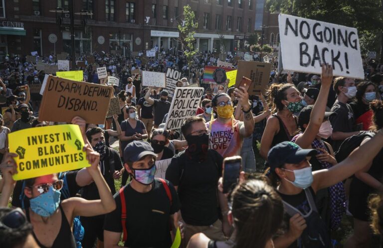 More than 1,000 people gathered in front of Cambridge City Hall for a Black Lives Matter protest, organized by Defend Black Lives Cambridge, June 20, 2020. Erin Clark/Boston Globe Photo