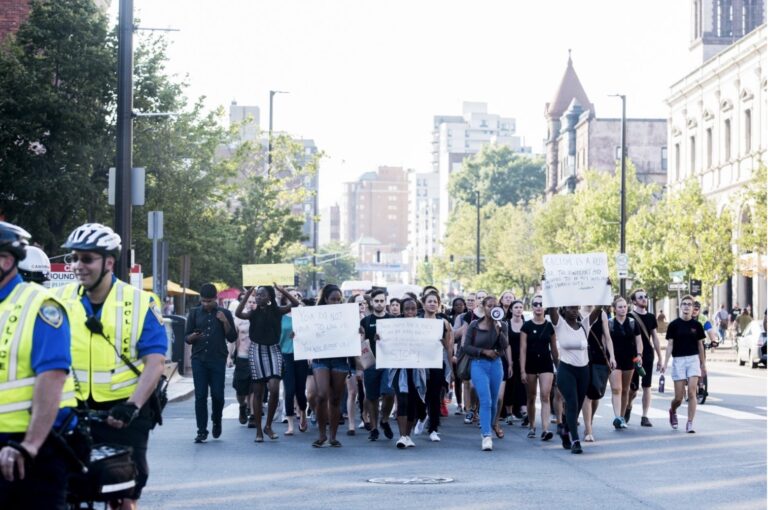 Members and supporters of Black Lives Matter Cambridge march through Central Square, following a community meeting July 29, 2016. Wicked Local Staff Photo / Sam Goresh.
