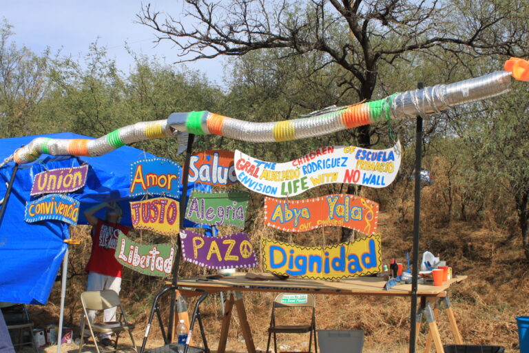 Signs Hanging by Sunny Robinson