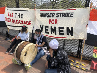 Iman Saleh (with drum) on hunger strike  in Washington D.C. to protest the blockade and war against Yemen; seated next to her is Rep. Ilhan Omar. Hassan El-Tayyab photo