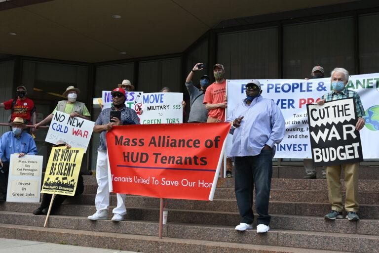 Protesters gather at the Tip O'Neil Federal Building on Tax Day 2021 to demand that their tax dollars go towards the people and the planet and not the profits of the wealthy and corporations. (Photo by Minetaka Shimada/ Akahata)