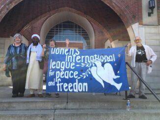 WILPF Boston at Islamic Cultural Center of Boston, August 19, 2017 for anti-fascist march. L to R: Barbara Stahler-Sholk, one of the imams of the mosque, Joan Ecklein, and David Rothauser. Photo courtesy Barbara Stahler-Sholk