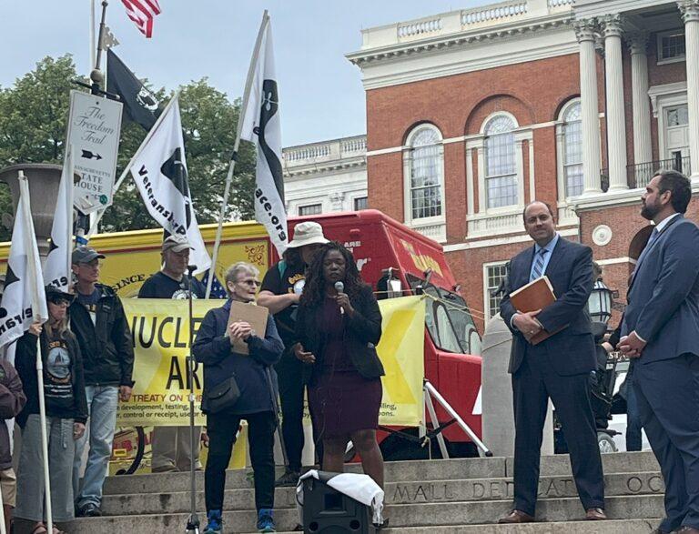 Boston City Councilor Ruthzee Louijeune speaks in welcome of the Golden Rule on the State House steps, June 20, 2023