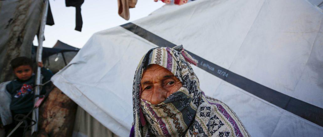 Palestinians living in displacement camps in central Gaza Strip continue their daily lives in harsh conditions amid the tents © December 2025 UNRWA photo