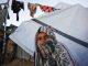 Palestinians living in displacement camps in central Gaza Strip continue their daily lives in harsh conditions amid the tents © December 2025 UNRWA photo