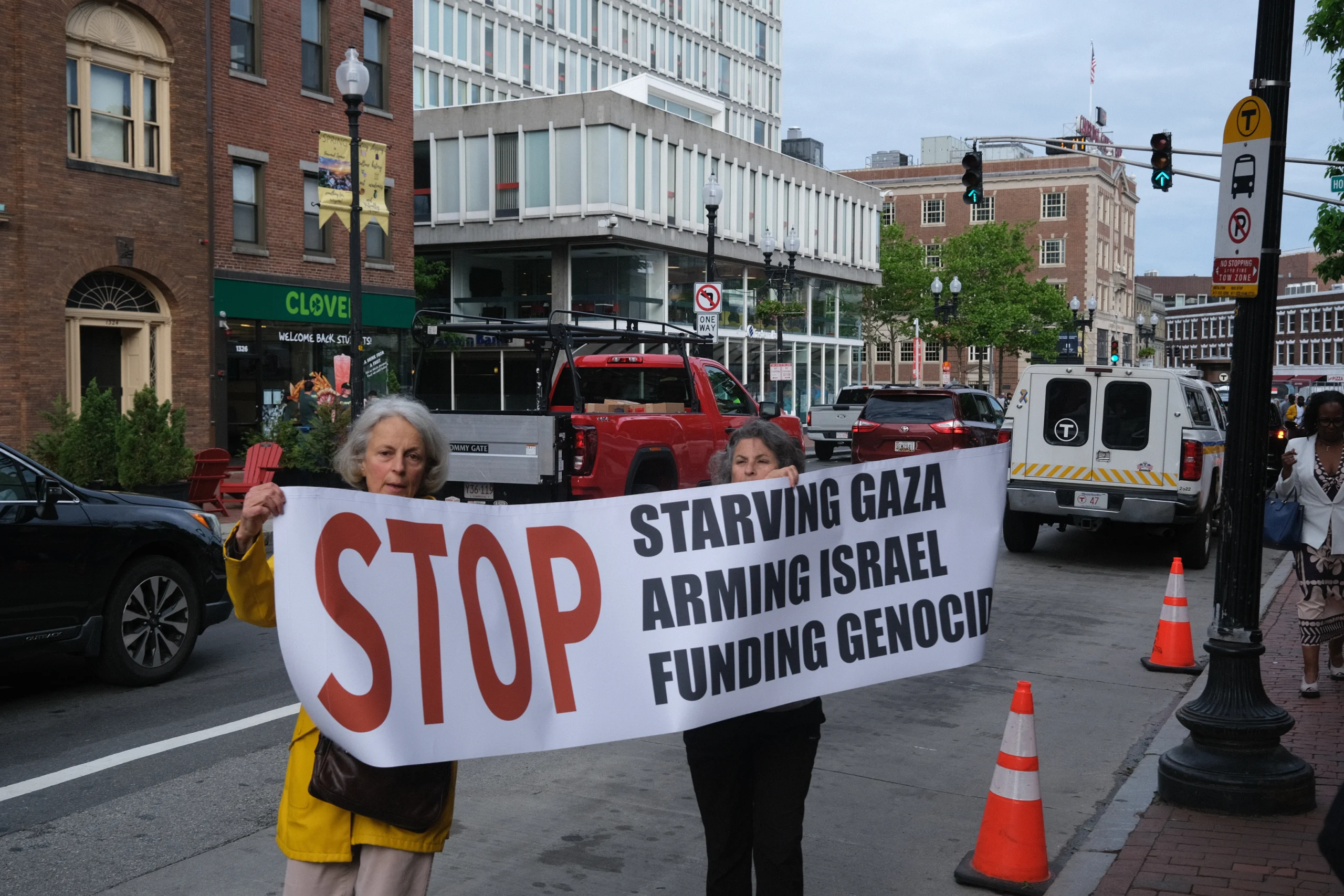MAPA activists carrying a banner calling for an end to military support for war